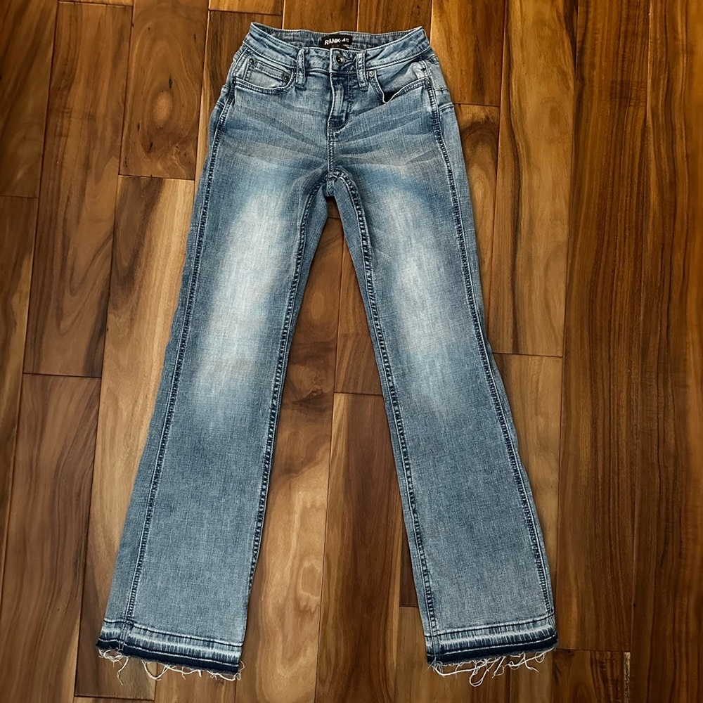Rank 45 low rise medium wash boot cut jeans, size 25, inseam 31in, outseam 39in